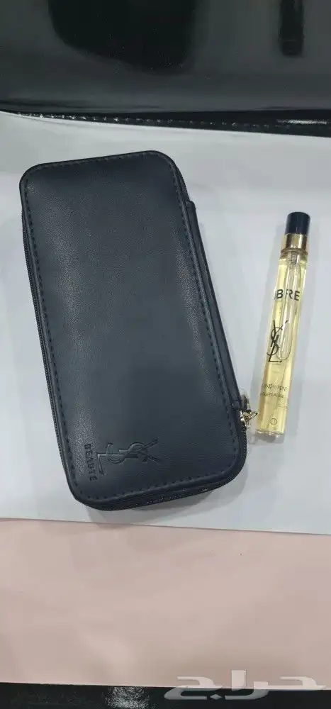 شنطة مكياج من افسان لوران مع عطر ليبر ابسلو بلاتين 10ملي 1