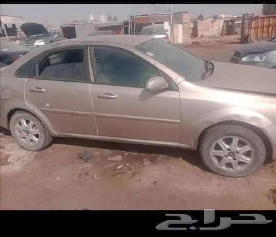 شفرولية اوبترا ذهبي موديل 2009 1