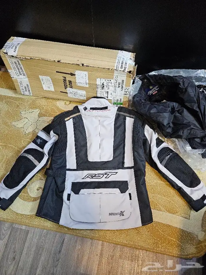 جاكيت XXL دراجه ناريه ادفنشر شركة RST لون(فضي) بكرتونها 2