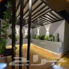 تركيب عشب صناعي تصميم جلسات ومظلات تنسيق حدائق 6
