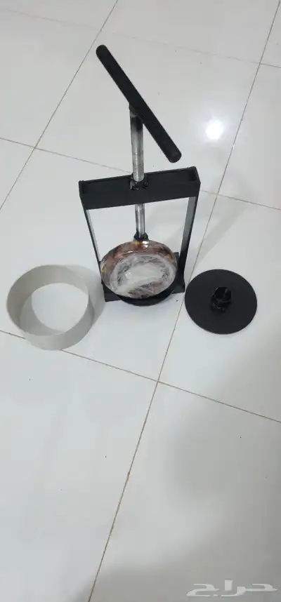 مكبس تمر يدوي 0