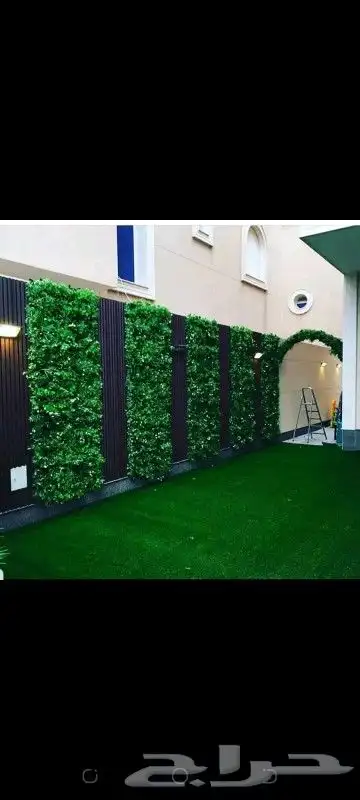 تنسيق حدائق عشب صناعي مع بديل الخشب 2