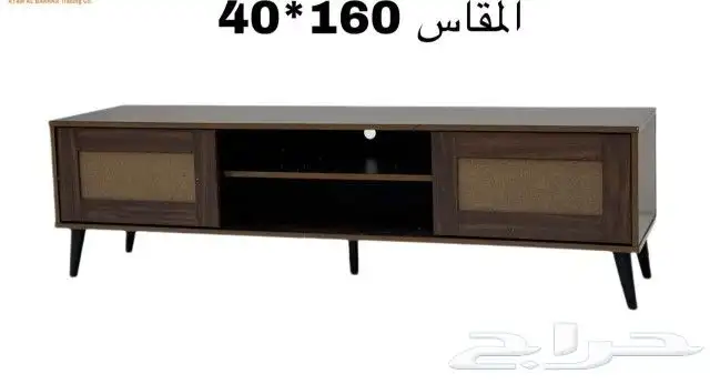 طاولات تلفزيون ب اشكال والوان مختلفه 7