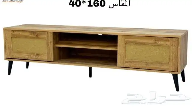 طاولات تلفزيون ب اشكال والوان مختلفه 6