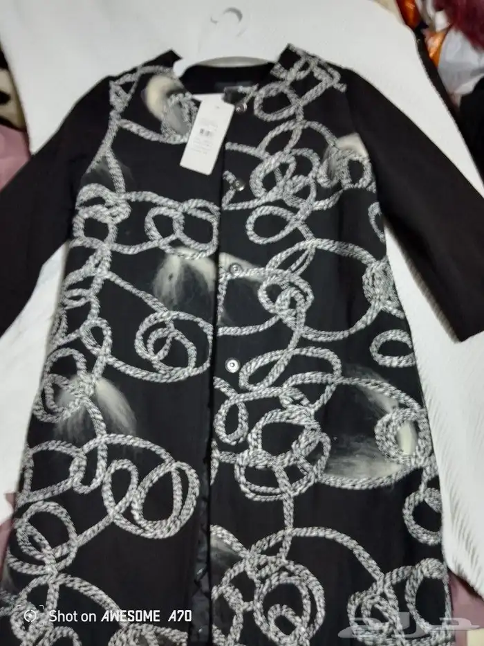 ملابس من الدبش متنوعة بناطيل وفساتين وتنانير 49