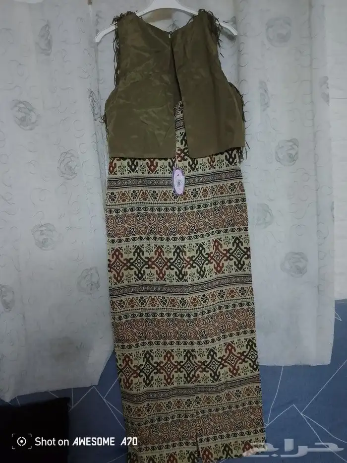 ملابس من الدبش متنوعة بناطيل وفساتين وتنانير 18