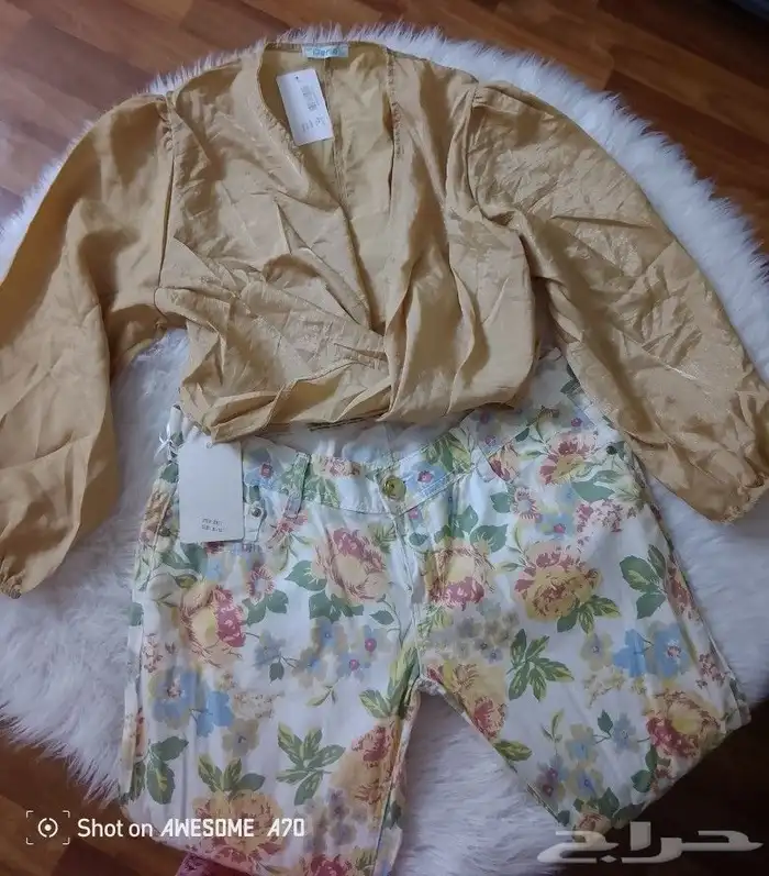 ملابس من الدبش متنوعة بناطيل وفساتين وتنانير 0