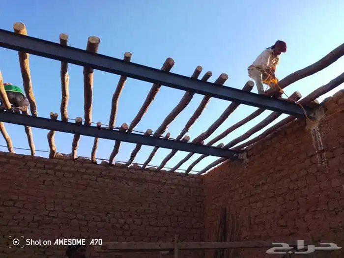 مباني تراث حجر وطين وسقواف وترميمت البيوت القديمه وتليوست لل 5