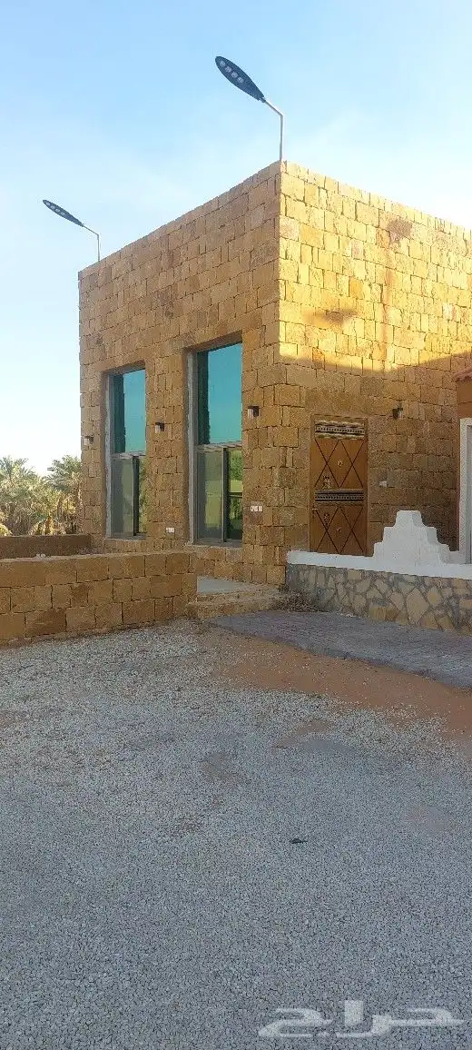 تنفيذ أعمال الحجر وبيوت الطين 8