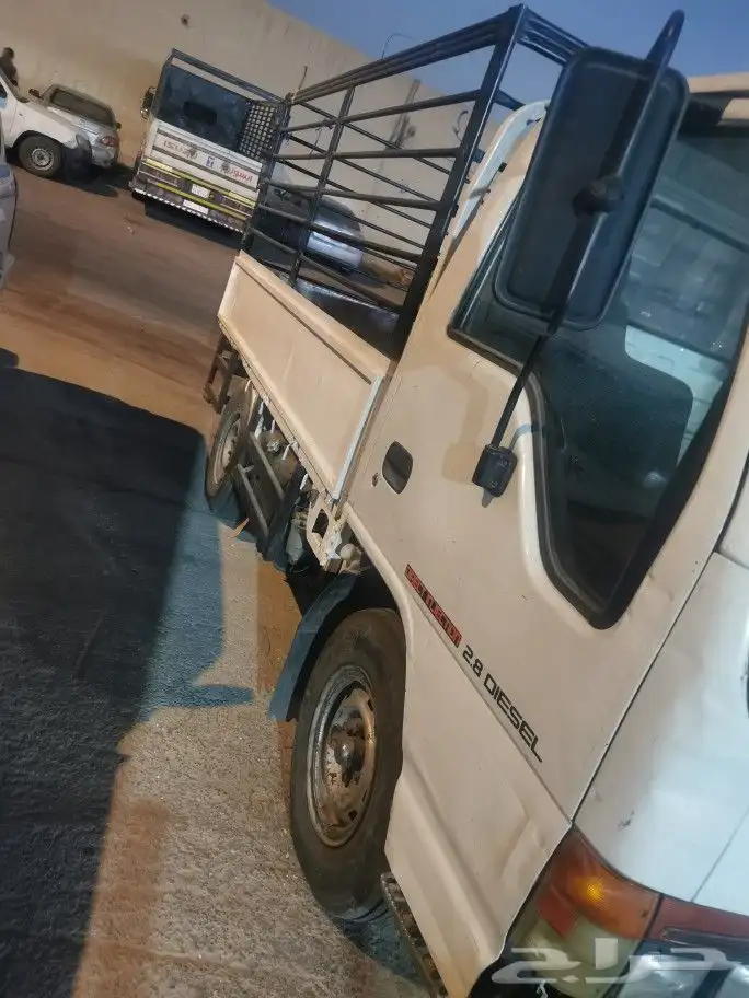 دينة - - أيسوزو - - موديل 2000 2