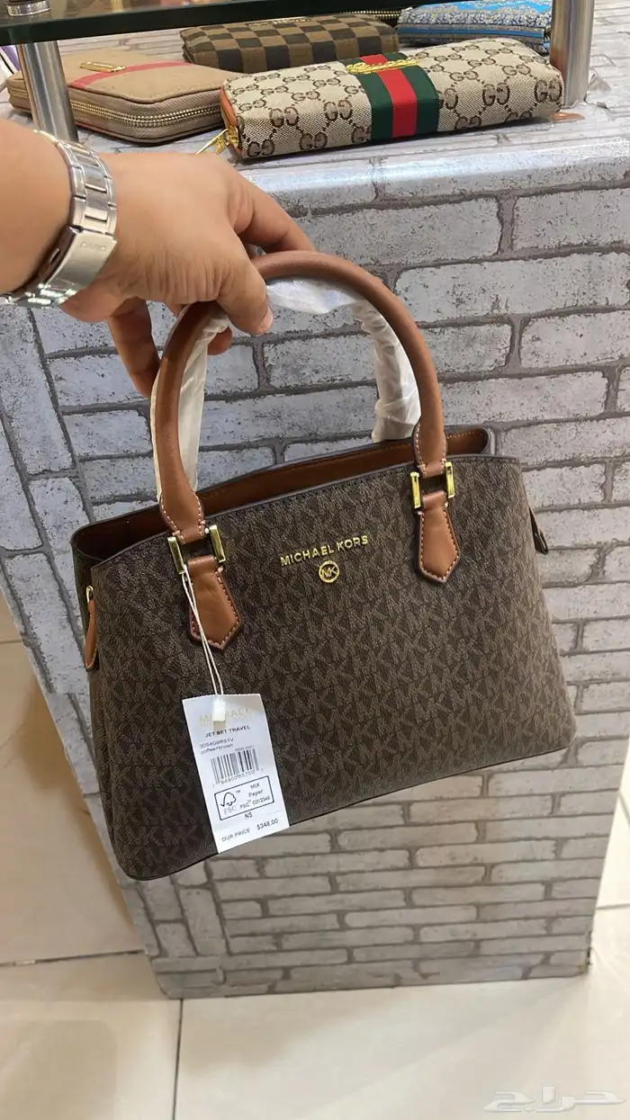 شنط ماركات مختلفه 47