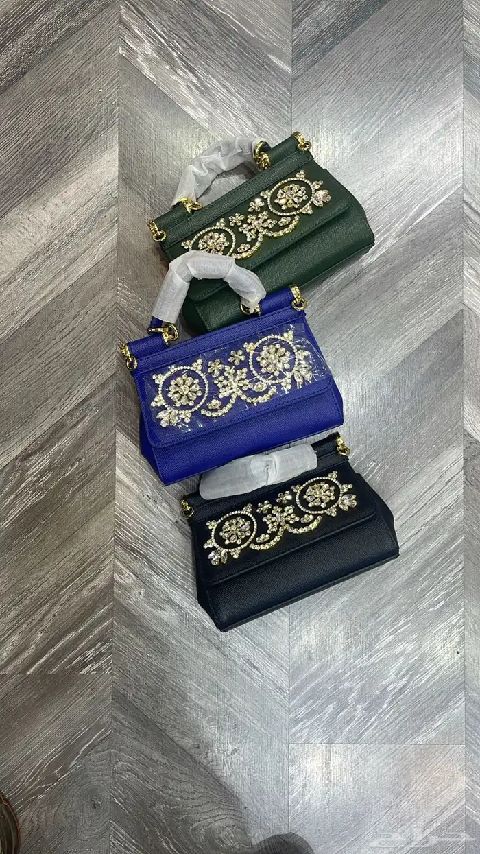 شنط ماركات مختلفه 36