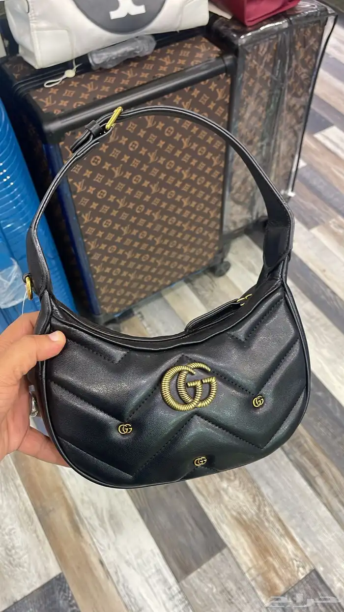 شنط ماركات مختلفه 42