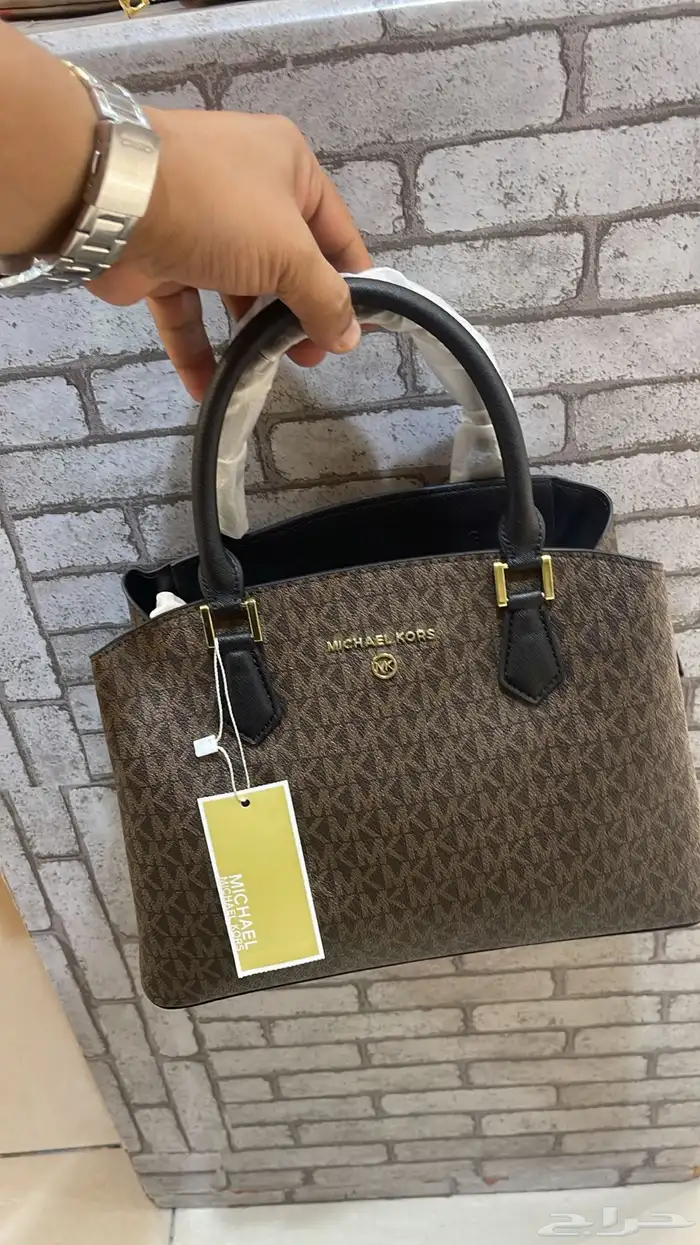 شنط ماركات مختلفه 44