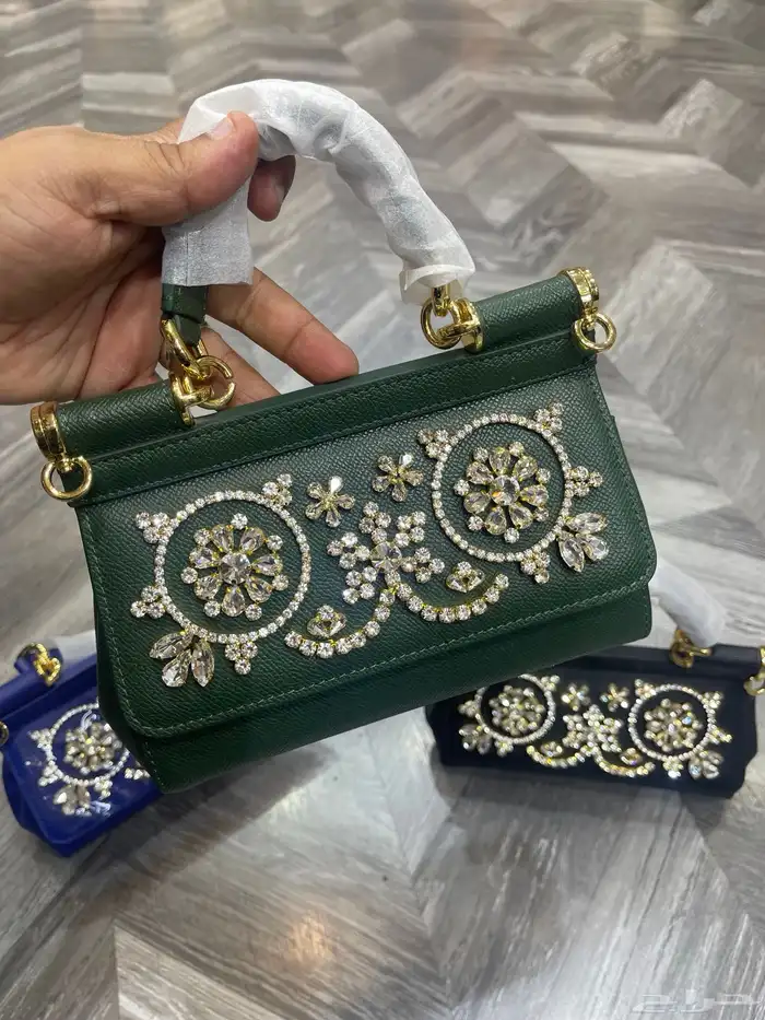 شنط ماركات مختلفه 34