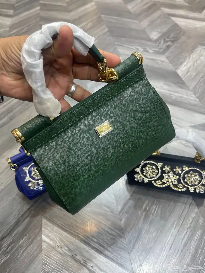 شنط ماركات مختلفه 35