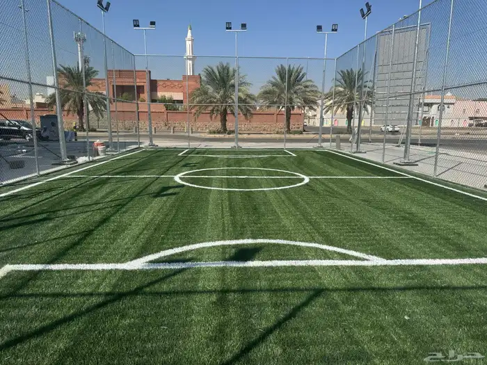 إنشاء ملاعب كرة القدم بالعشب الصناعي وارضيات مطاطية 61