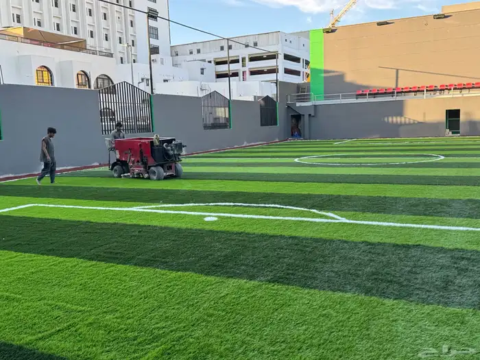 إنشاء ملاعب كرة القدم بالعشب الصناعي وارضيات مطاطية 54