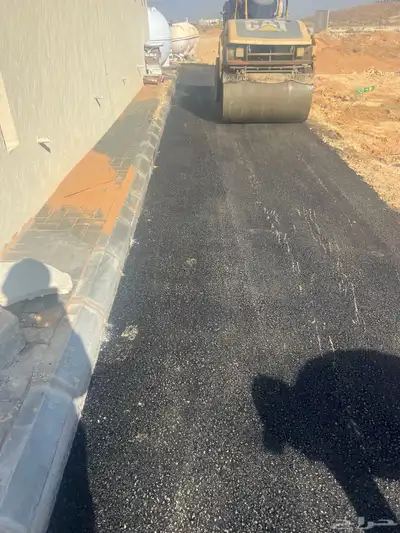 أعمال الأسفلت والقشط والتربة 0