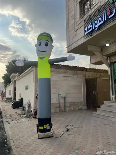 دمية ترحبيه وقوس بلونات 1