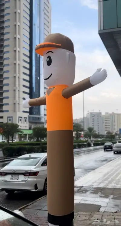 دمية ترحبيه وقوس بلونات 0