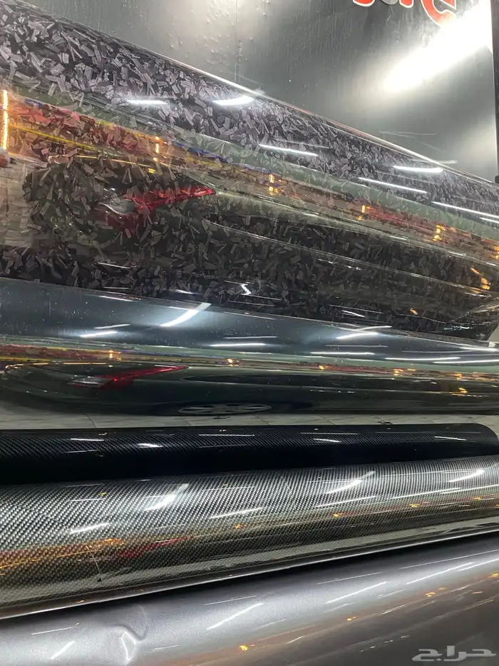 تجليد اسود بيانو بلاك ولياف الكاربون 0