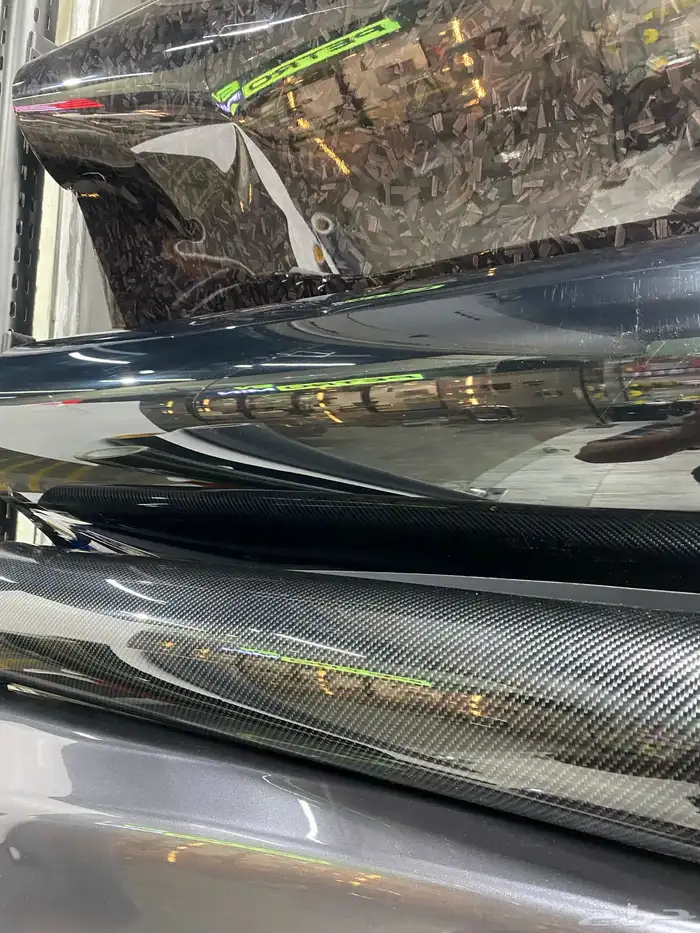 تجليد اسود بيانو بلاك ولياف الكاربون 1