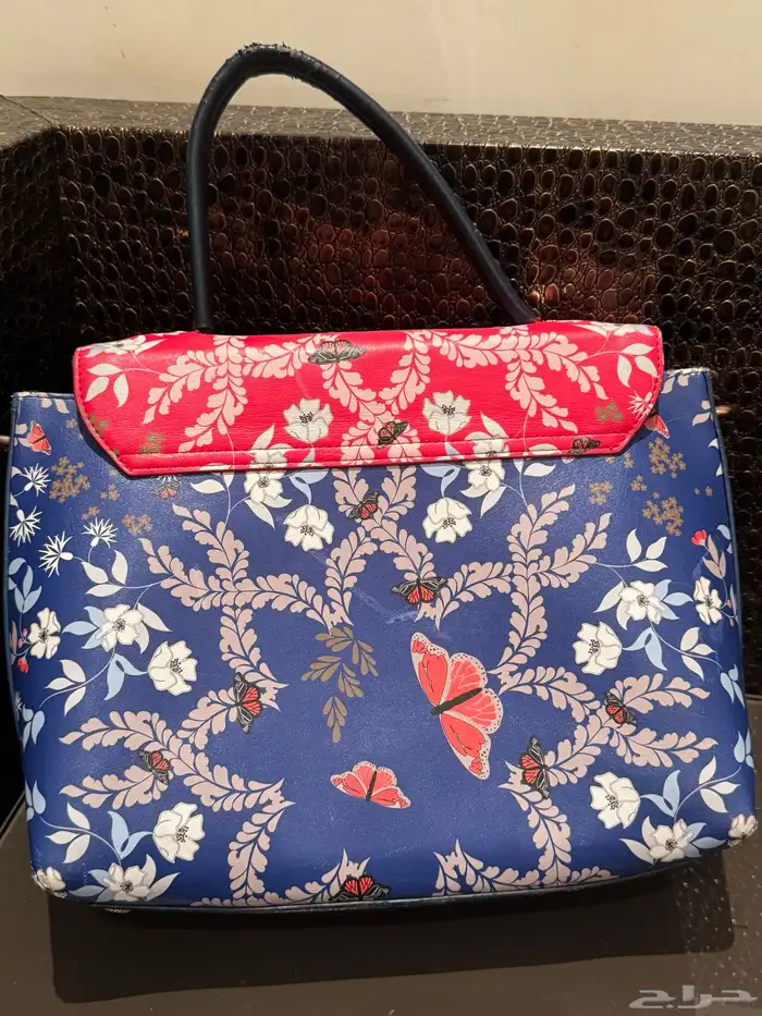 شنطة تيد بيكر تخفيض ب 100 1