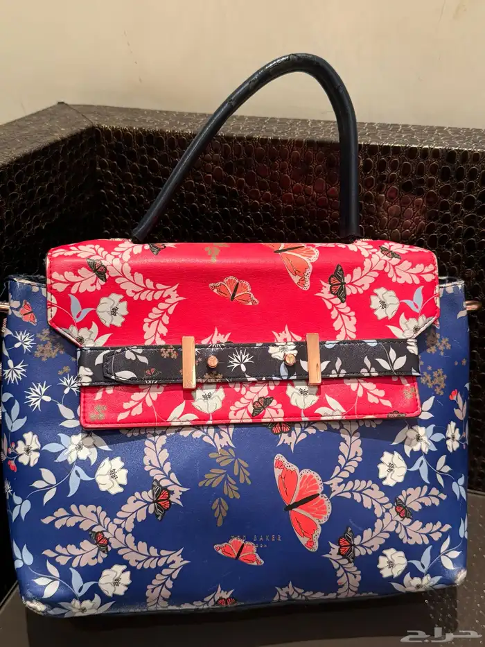 شنطة تيد بيكر تخفيض ب 100 0