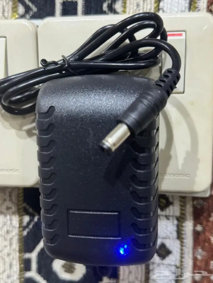 شاحن ومحول التيار الكهربائي للكاميرات DC12V 2A AC 6