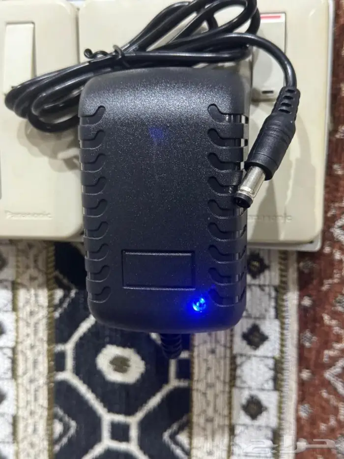 شاحن ومحول التيار الكهربائي للكاميرات DC12V 2A AC 5