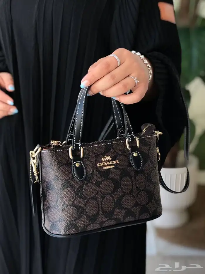 شنط نسائيه تقليد ماركه هاي كواليتي مع الملحقات 47