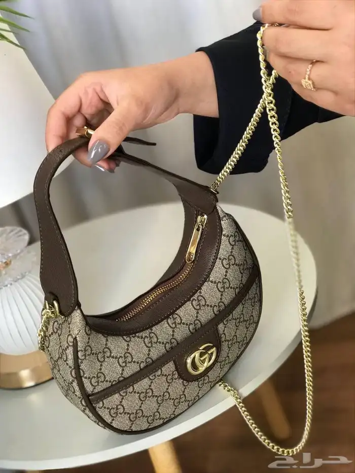 شنط نسائيه تقليد ماركه هاي كواليتي مع الملحقات 91