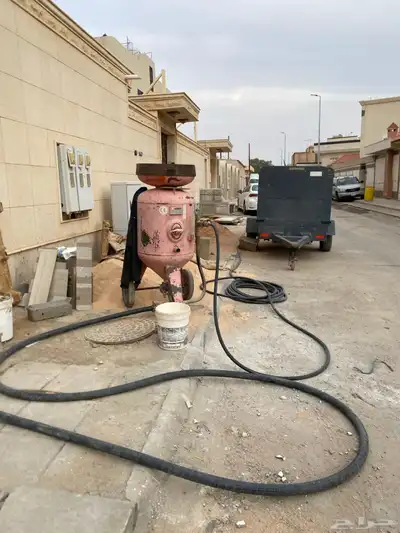 ازالة صبغ المباني وتنظيف واجهات الحجر بالرمل 5