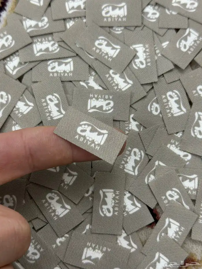 طباعة ليبل قماش للعبايات بكجات تغليف عروض خاصة 1