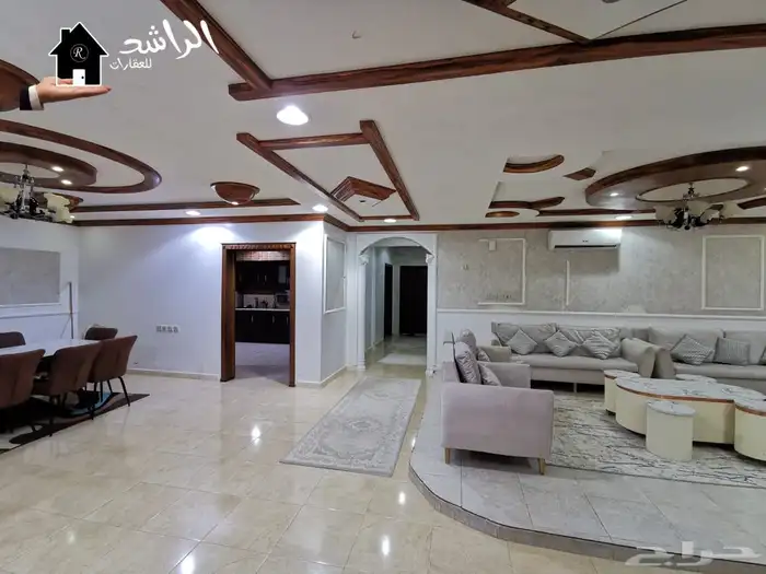 فيلا للبيع بحي الملك خالد بعنيزة 14
