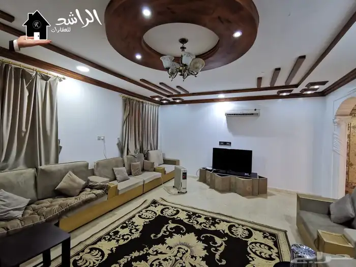 فيلا للبيع بحي الملك خالد بعنيزة 11