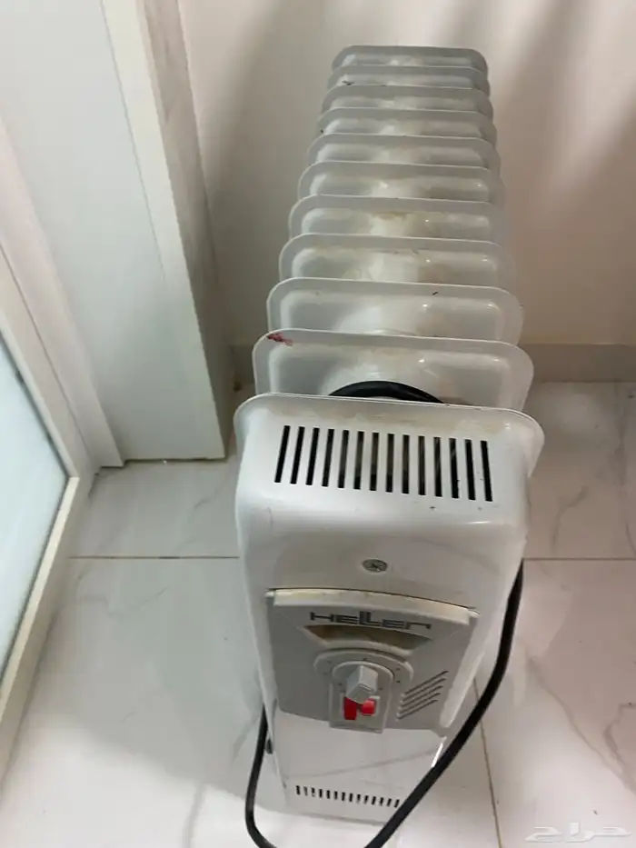 دفاية زيت 12ريشه 200  خط 110 ف 0