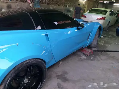 ورشة رش بوية سيارات وتغيير لون السيارة 34