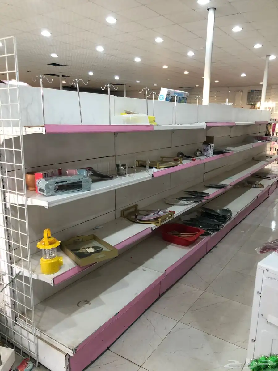 رفوف بقالة (67)متر وسط   30 متر جدار 1