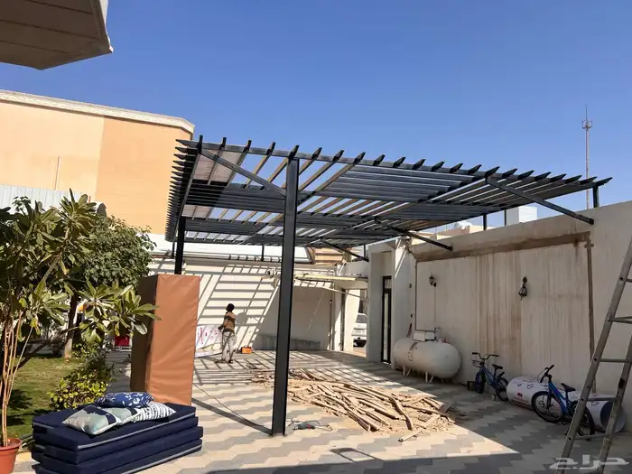 مظلات ليزر مظلات سيارات سواتر شرايح سواتر لكسان 12