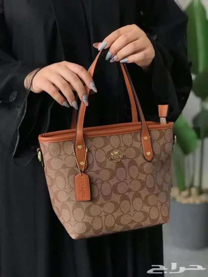 بضاعة جديدة شنط كوتش العالمية طبق اصل شنطة درجة اولى COACH 70