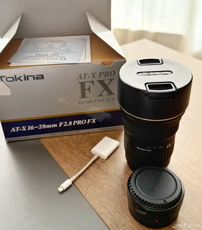 للبيع عدسة كانون من شركة توكينا 16-28 f2.8 مع محول العدسة 0
