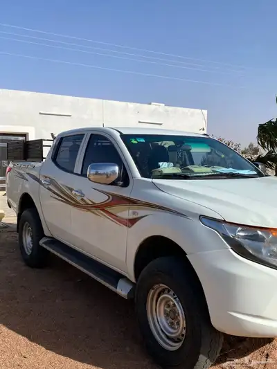 مستبيشي 2018 دبل L200 ديزل ممشى 300 الف 4
