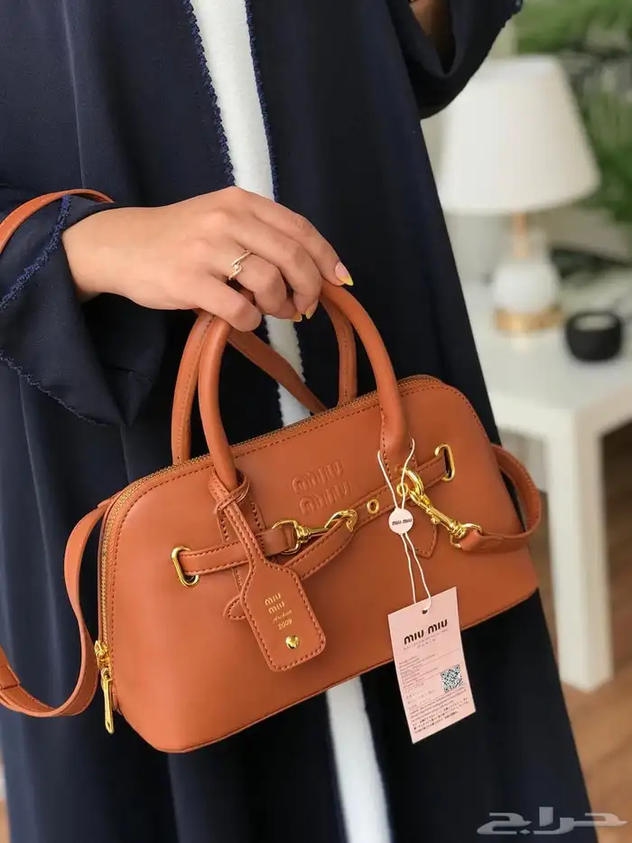 شنط كوتش ميو ميو توري بورش اشكال كثيره ومتنوعه 38