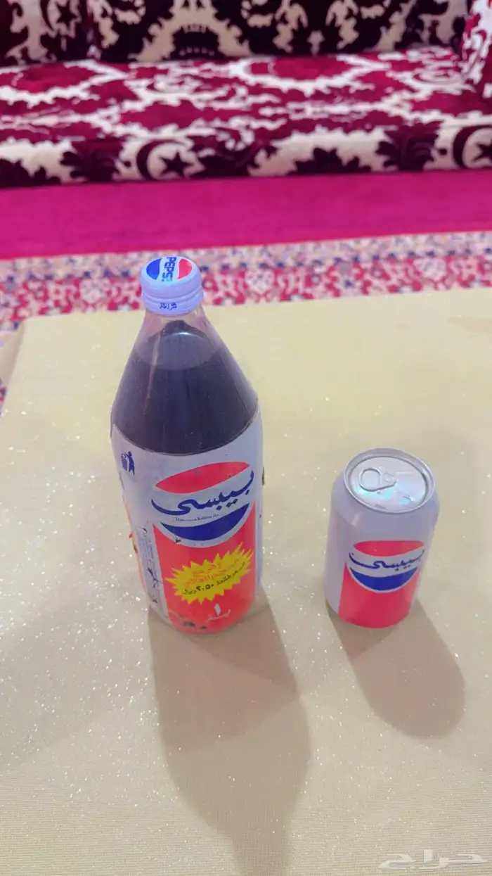 زجاجة بيبسي واحد لتر مع علبة بيبسي 1