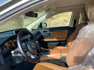 لكزس آر إكس موديل 2021 شبه وكالة تيتانيوم هايبرد ممشى 84 ألف 10