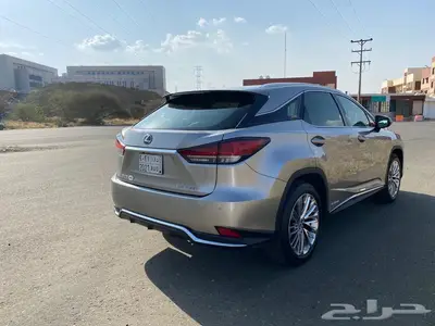 لكزس آر إكس موديل 2021 شبه وكالة تيتانيوم هايبرد ممشى 84 ألف 12