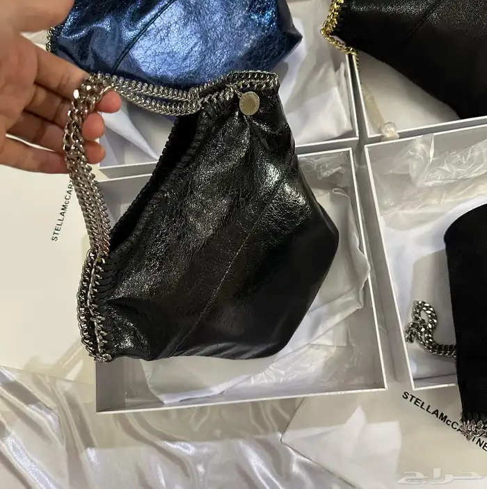 شنط ماركة ميو ميو مع جميع الملحقات 39