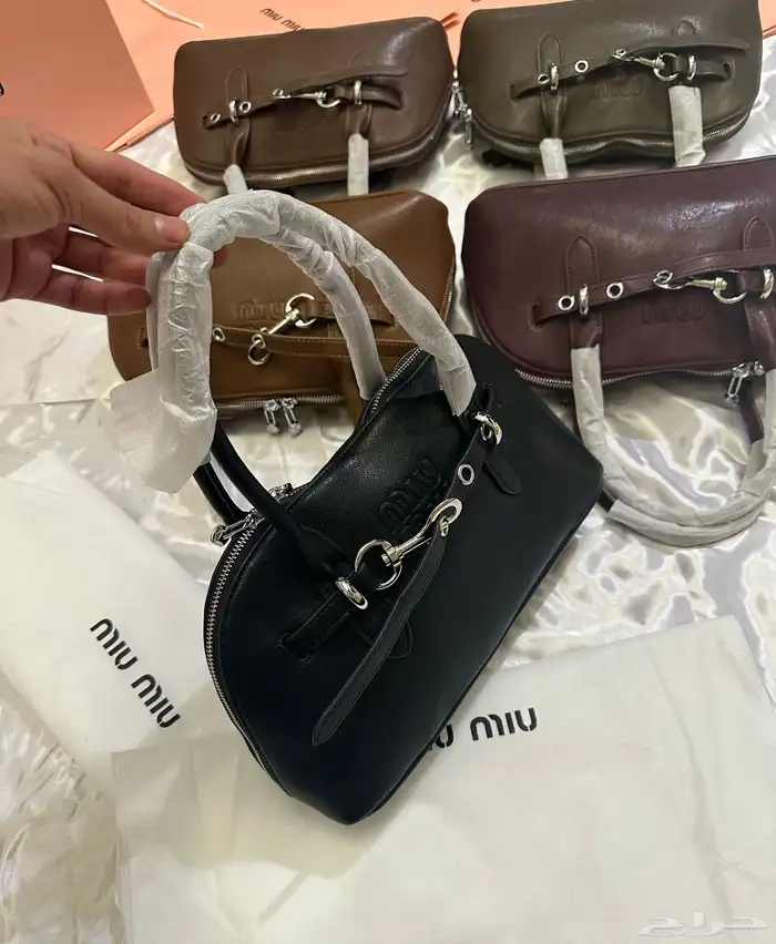 شنط ماركة ميو ميو مع جميع الملحقات 7